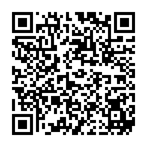 Werbung von woonceome.com QR code